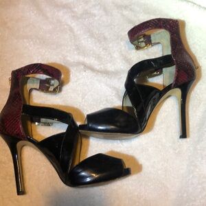 Women’s Michael Kors 7 1/2 red snake skin and black heels